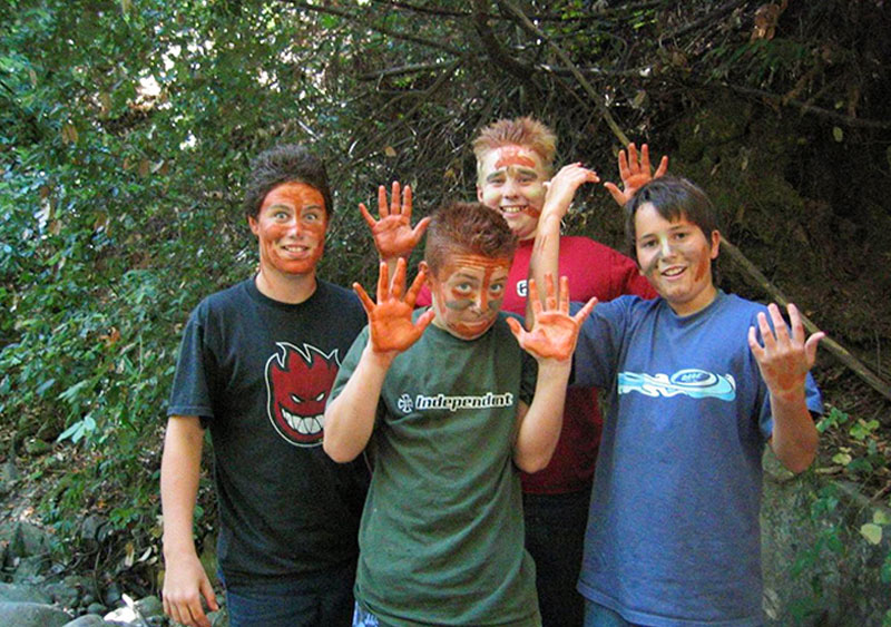group of boys with painted hands